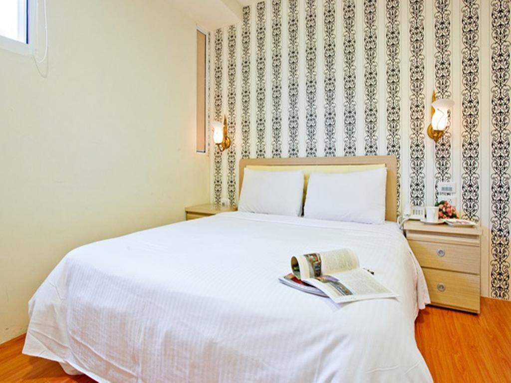 Green Park Commercial Hotel Tainan Quarto foto