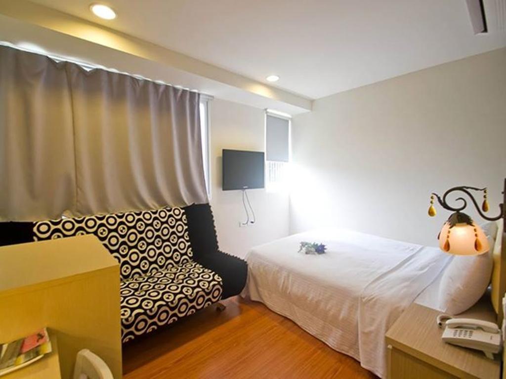 Green Park Commercial Hotel Tainan Quarto foto